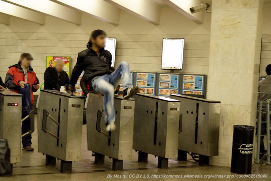 Fare evader jumping turnstile at Moscow subway